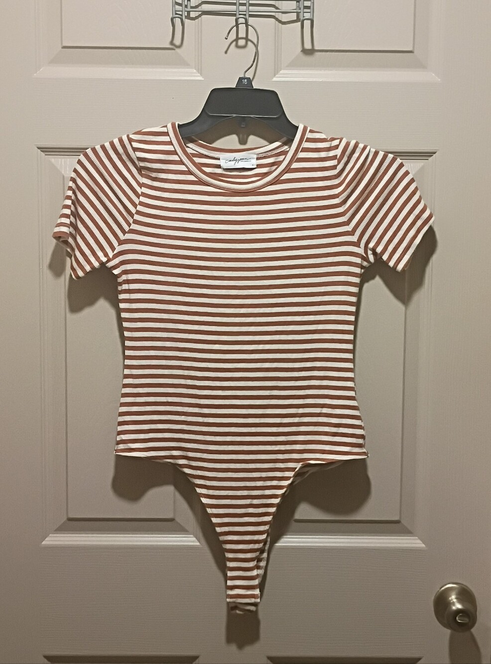 Carly Jean Los Angeles white and brown / orange striped bodysuit Size Large